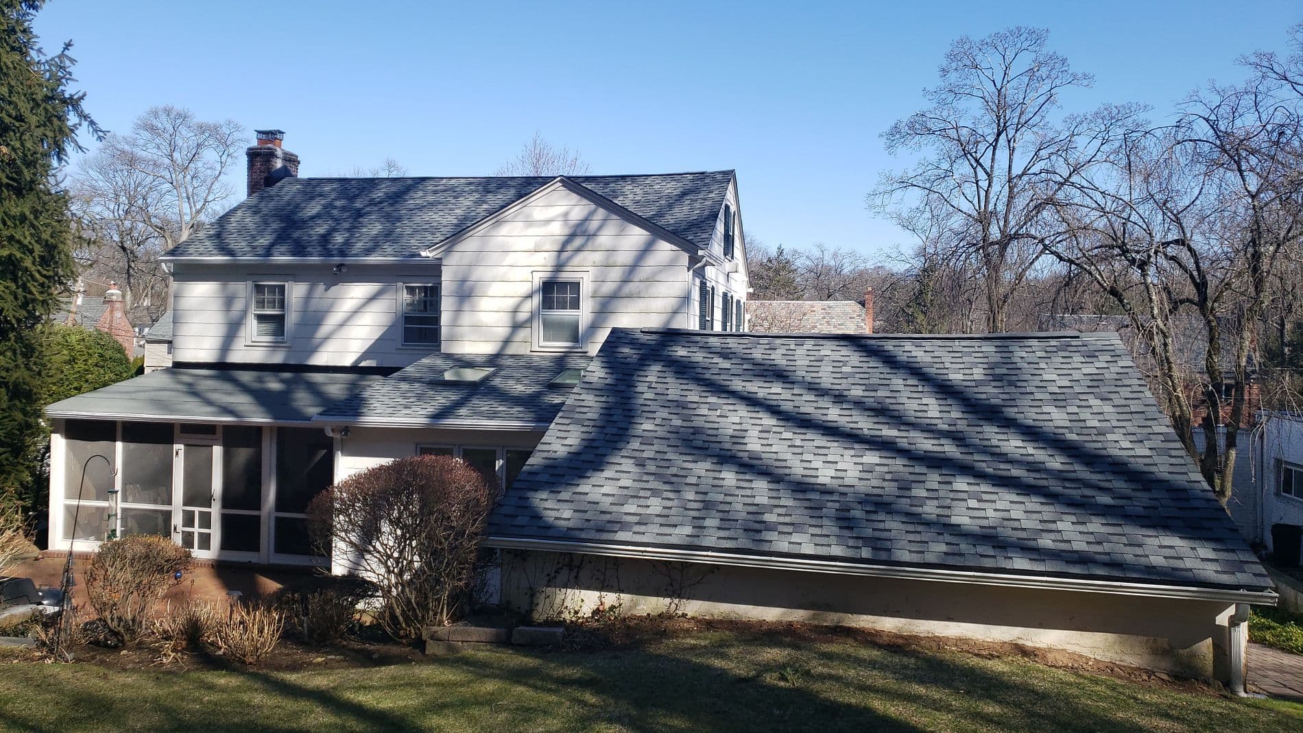 shaded home with gray roof