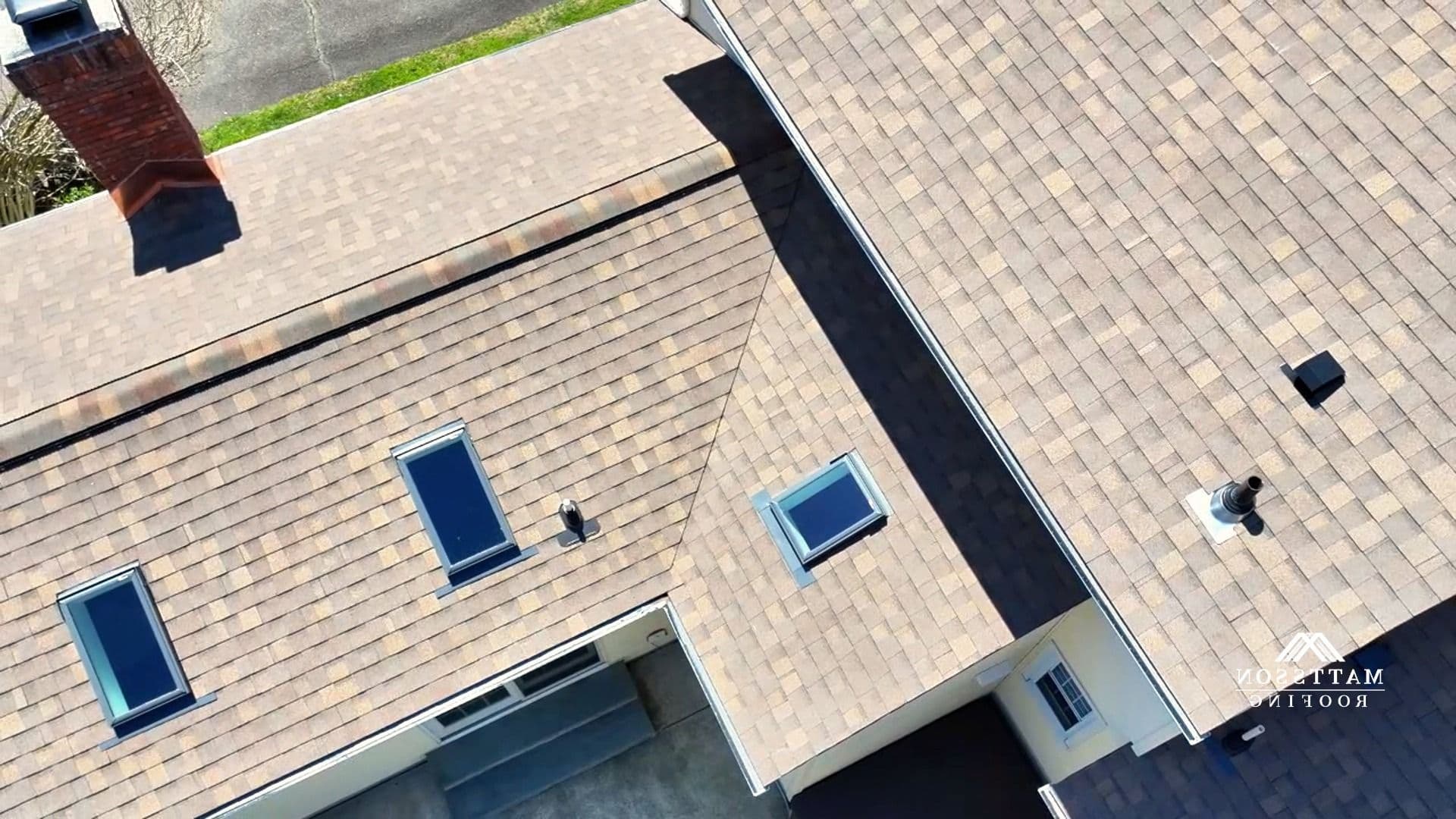 roof with velux skylights and atlas pinnacle sun shingles